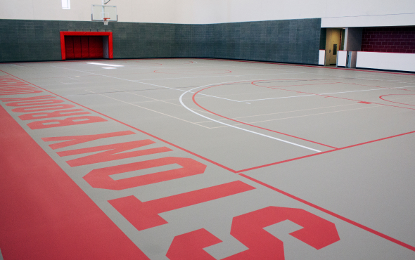 Milburn Flooring higher education flooring solutions installed in university gymnasium with Pulastic sports flooring