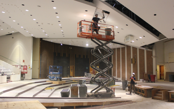 Auditorium flooring and renovations in progress at a middle school.