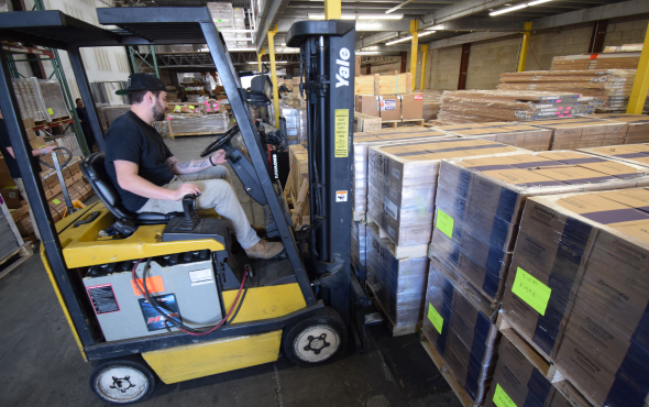 Construction crew preparing materials and equipment, ready to deliver results.