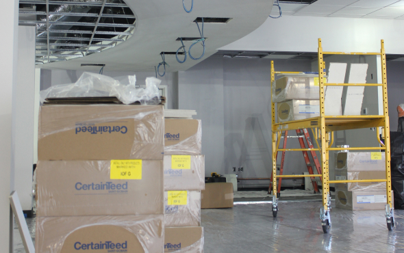 Close-up of CertainTeed ceiling tiles during trusted ceiling tile solutions installation.