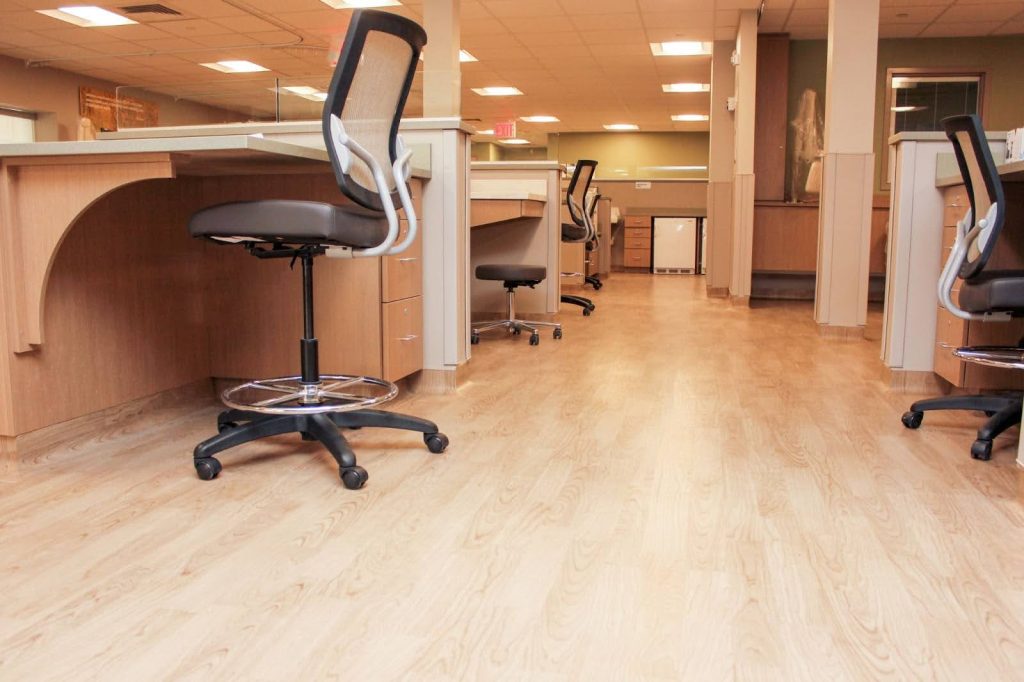 Healthcare office space featuring durable wood flooring for a professional, hygienic environment.