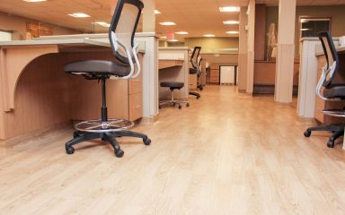 Healthcare office space featuring durable wood flooring for a professional, hygienic environment.
