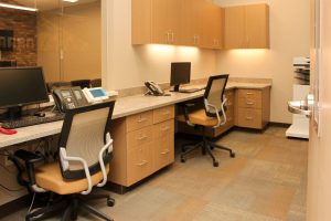 Reception area in a healthcare facility with new carpet flooring designed for comfort and safety.