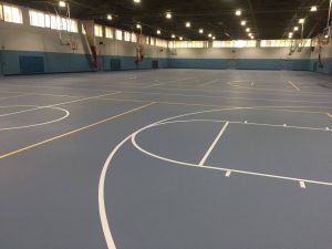 Newly installed Pulastic flooring in a multi-sport athletic facility