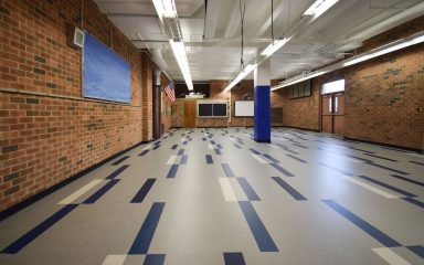 Durable, safe school lobby flooring with modern design, part of a school flooring safety checklist
