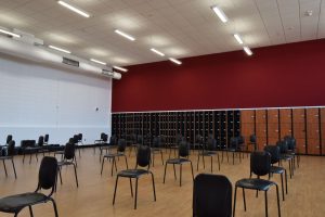Hardwood flooring in a school music room designed to enhance acoustics and reduce echo
